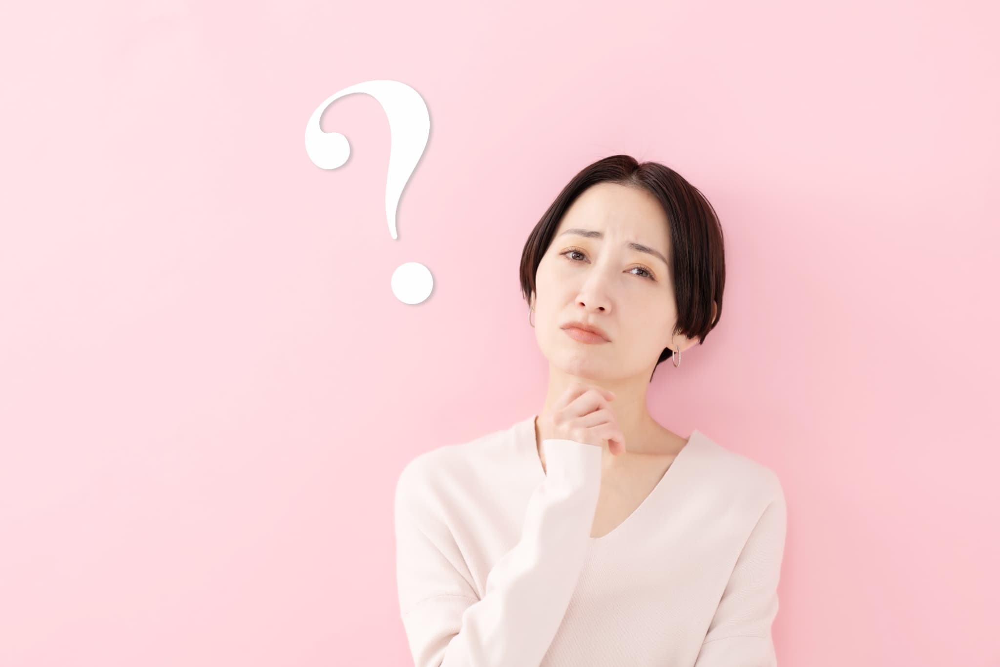 歯のクリーニングだけでも受けられるのか考える女性
