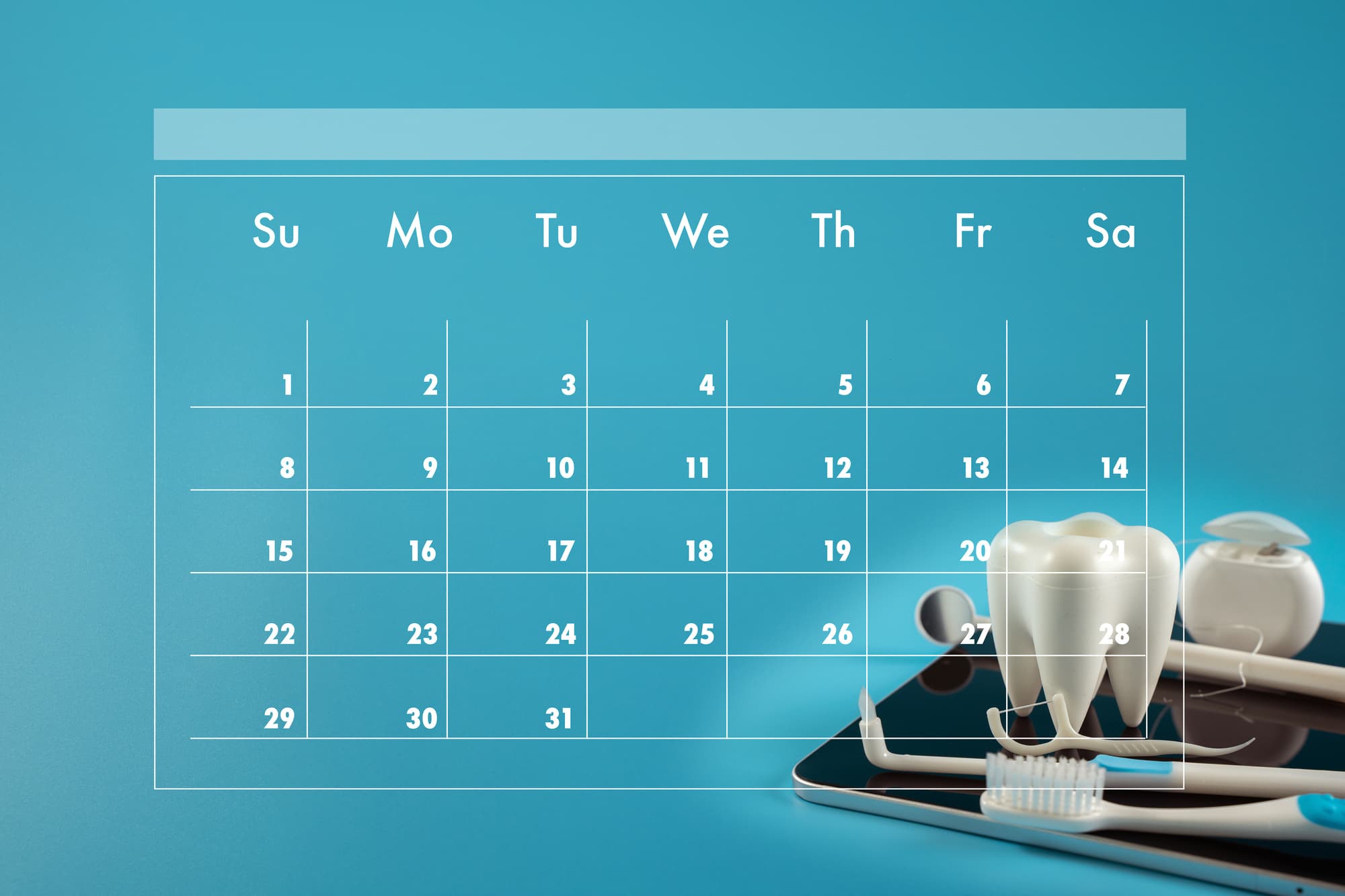 インプラント周囲炎を予防するためのデンタルケア用品と定期歯科検診を受けるイメージのカレンダー
