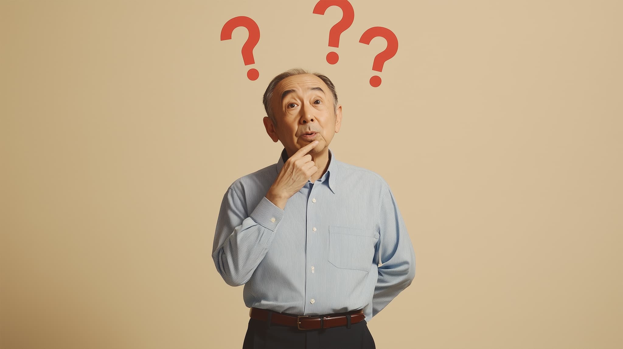 入れ歯のお手入れを怠るとどうなるのか考える高齢男性