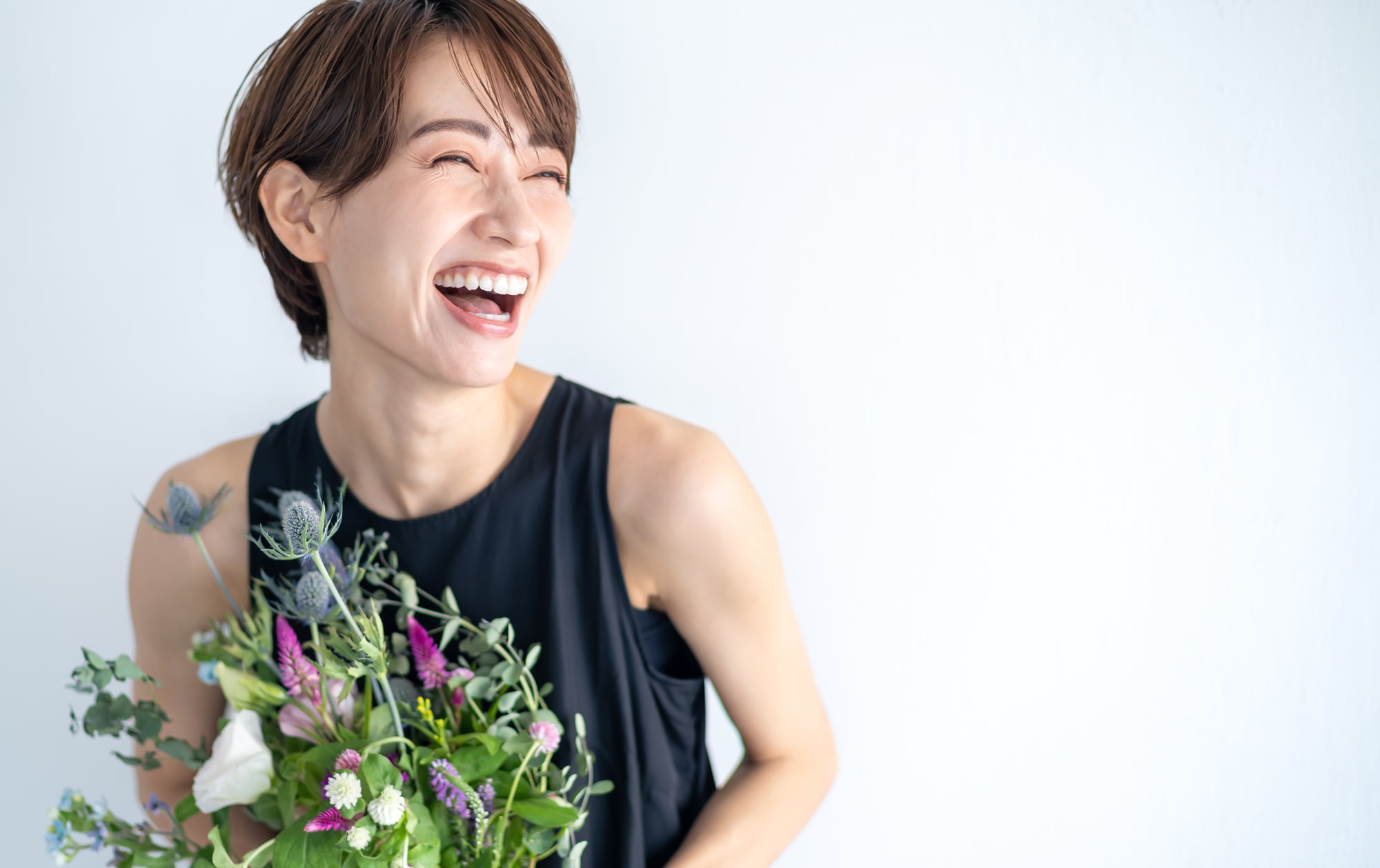 顎の痛みが治って笑顔の女性